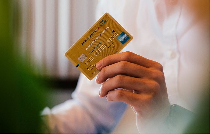 Holding a card ready to pay