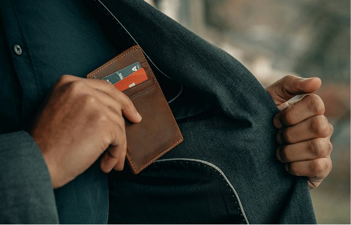 Taking a card out of a wallet
