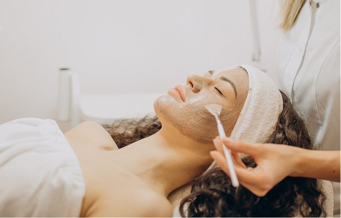 A facial treatment being applied